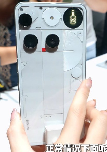 The transparent back of a white Nothing Phone (3)